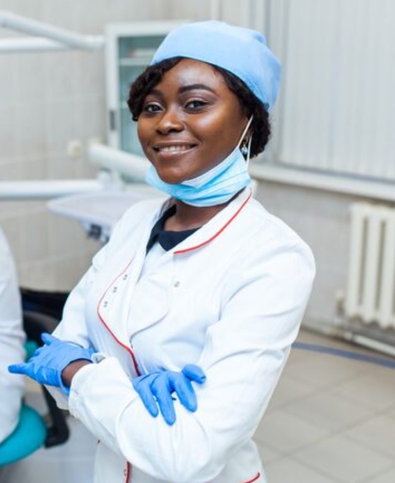 Smiling dentist ready to welcome a patient